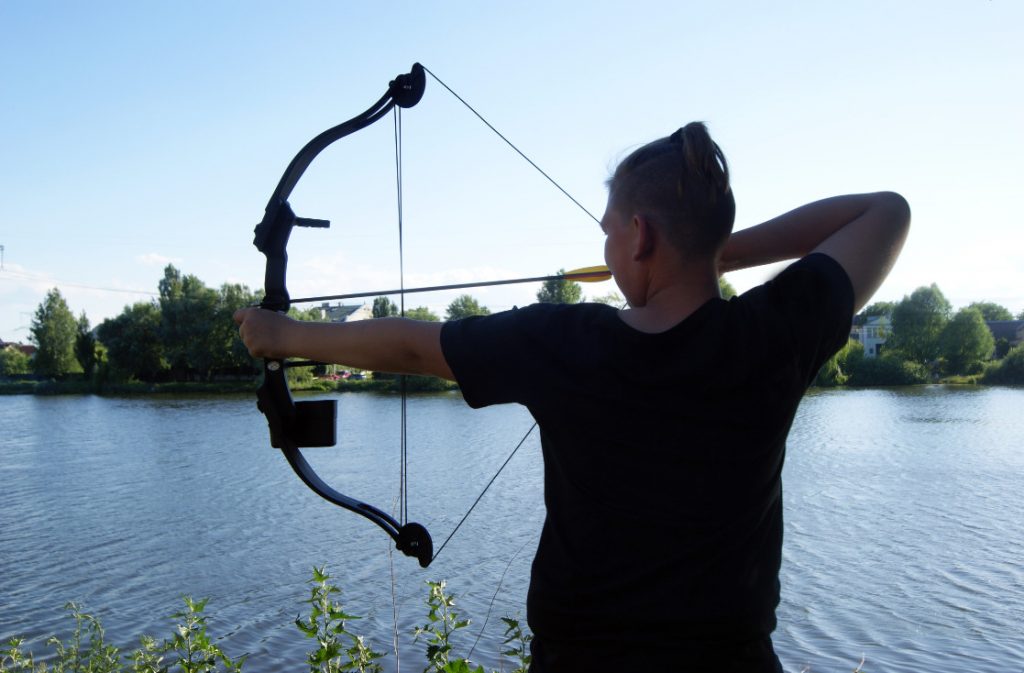 421 Bow Arrow Fishing Royalty-Free Images, Stock Photos & Pictures